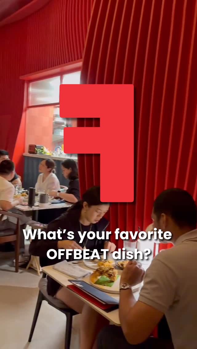 Offbeat Bistro dining room with bold red walls